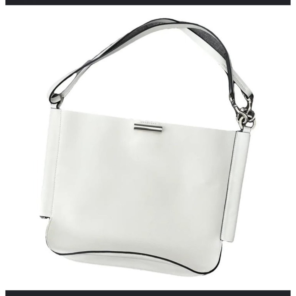 Stuart Weitzman Dorian white Small Hobo Bag featuring a crossbody strap handle